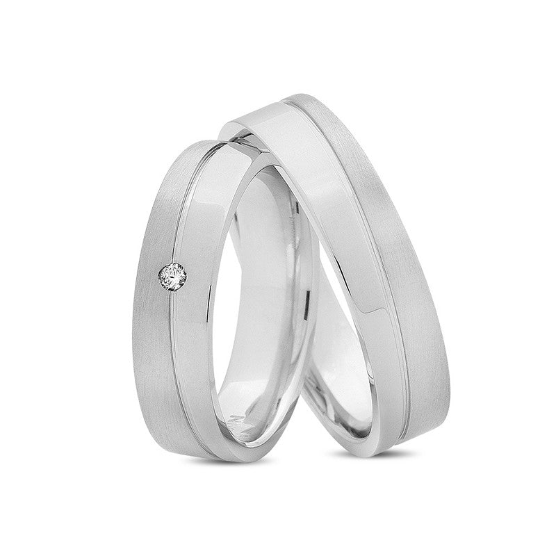 Unikke Nuran vielsesringe i 14 kt hvidguld med 0,02 ct diamant og silkemat/blank overflade.